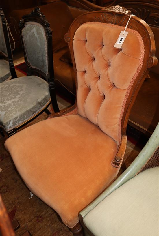 A Victorian mahogany framed spoonback chair, upholstered in buttoned pink dralon